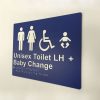 blue-and-white-plastic-unisex-toilet-left-hand-baby-change-sign